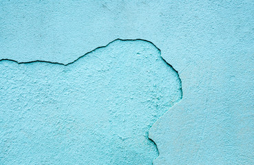 Texture of blue sea exposed concrete wall with  gap - blue plaster. Indian style