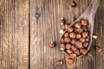 Obraz premium Heap of Hazelnuts (selective focus)