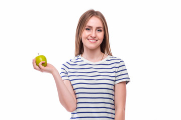 Young girl  eat apple. Female teeth  and apple. Healthy eating on white background