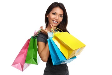 Happy asian girl with shopping bags.