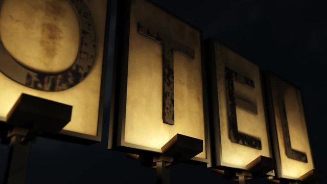 Old Grungy Motel Sign Closeup at Night 