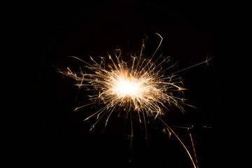 party firework sparkler on black background
