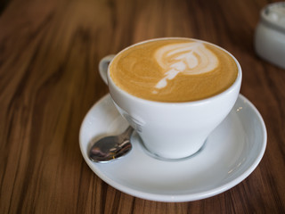 Coffee cup on a wooden table
