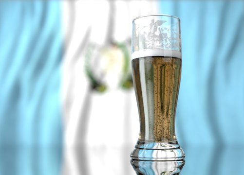 a glass of beer in front a guatemalan flag. 3D illustration rendering.
