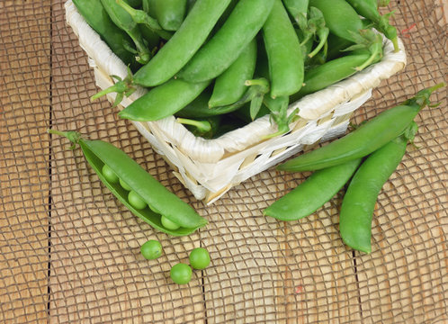 Fresh, young green peas. Healthy eating.