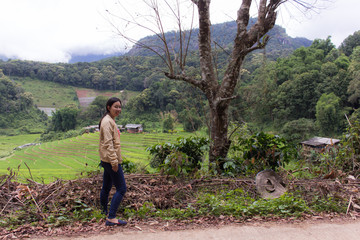 Thai woman with Terraced Rice Field, Pha Mon Chiangmai Thailand