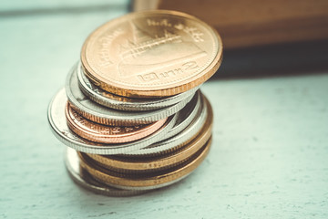 business finance. save money for investment concept coins with f