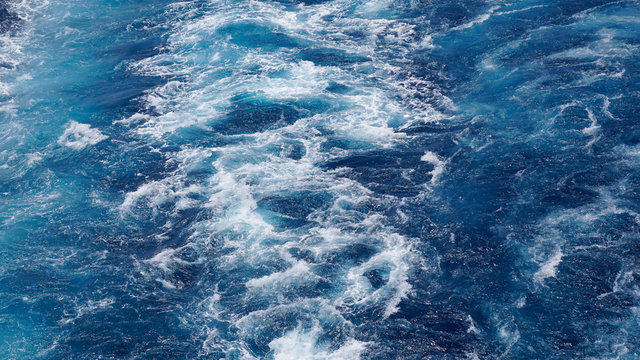 foam on the blue sea