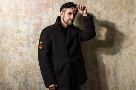 Attractive Young Bearded Man In A Pea Coat