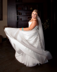 Bride Twirling In Her Wedding Dress