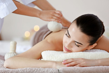 Obraz na płótnie Canvas Young woman having spa procedures at the beauty salon