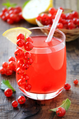 Fresh homemade red currant lemonade with mint and lemon