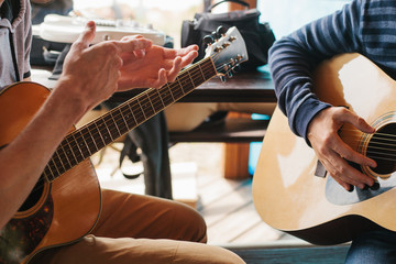 Learning to play the guitar. Music education and extra-curricular lessons.