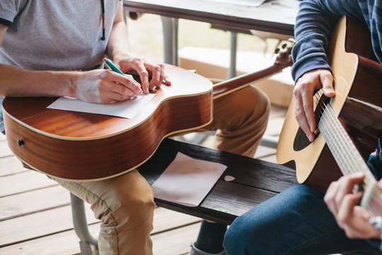 Learning to play the guitar. Music education and extra-curricular lessons.