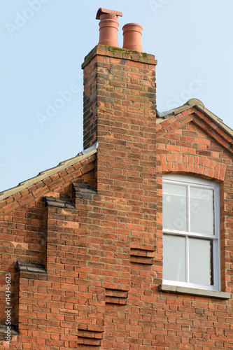 Chimney T With A Series Of Steps Leading Up To Roof On Chimney T With A Series Of Steps Leading Up To Roof On Victorian House