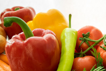 Closeup of fresh market vegetables on the white background