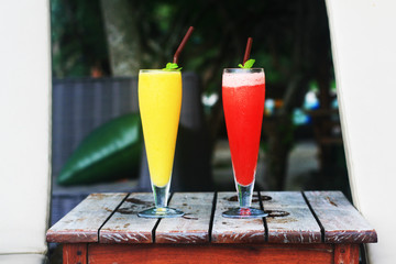 pineapple juice and watermelon juice on the wood table