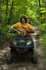  couple on four-wheeler ATV © tamarabegucheva
