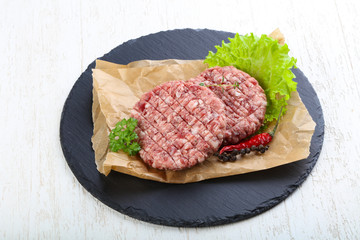 Raw burger cutlet