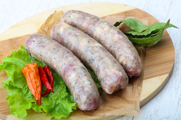 Raw sausages for cooking