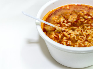 Instant noodle food with hot water in white plastic foam cup