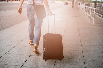 Fototapeta na wymiar Woman with her luggage