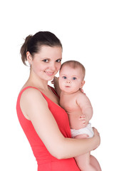 smiling young mother holding her cute baby child isolated on white