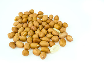 Processed peanuts on white background.