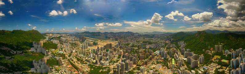 Aerial view of Hong Kong Scene with Victoria Harbour in sunny day
