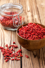 Wooden bowl with  goji berries