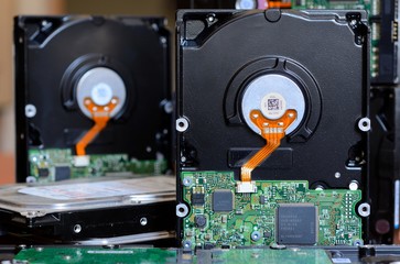 Stack of Old SATA and ATA Hard Disk Drives.