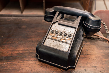 Old antique telephone on desk