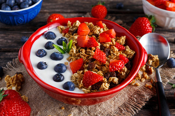 Homemade granola Breakfast with yogurt and fresh fruit berries. concepts health food