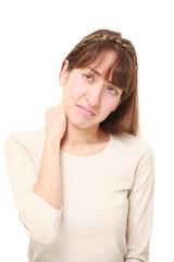 Fototapeta premium しつこい肩凝りに苦しむアラサーの女性