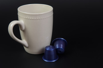 Coffee mug with capsules