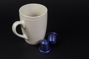 Coffee mug with capsules