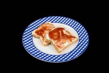 Breakfast toasts with butter and jam