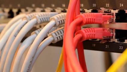 Network switch HUB and ethernet cables (LAN) in datacenter