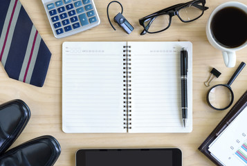 Cup of coffee on business desk office with copyspace