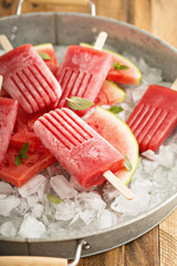 Watermelon and strawberry popsicles