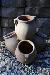 Tiered brown clay pots 