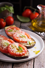 Grilled zucchini with tomatoes and cheese