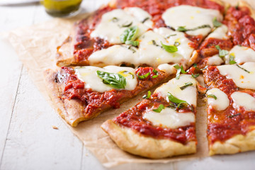Grilled Margherita pizza with tomato sauce and mozzarella