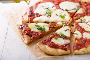Grilled Margherita pizza with tomato sauce and mozzarella