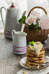 oat pancake with vanilla sauce, bananas,peanuts for Breakfast