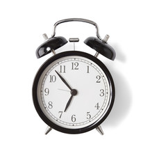 A black alarm clock isolated on a white background