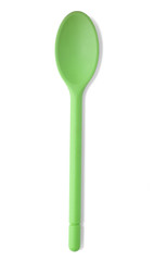 Kitchen cooking utensils - A green baking spoon isolated on a white background
