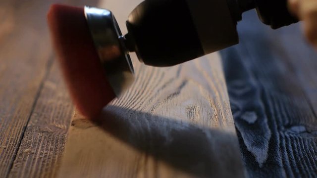 Wood brushing with with wire cup brush nylon for drill, close-up 