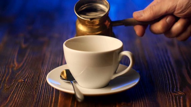 Serving a cup of Turkish coffee in the morning