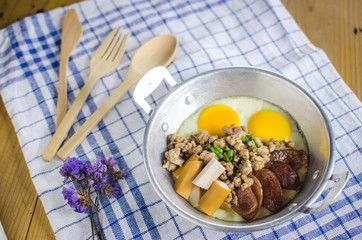 pan-fried egg with Chinese sausage, minced pork
